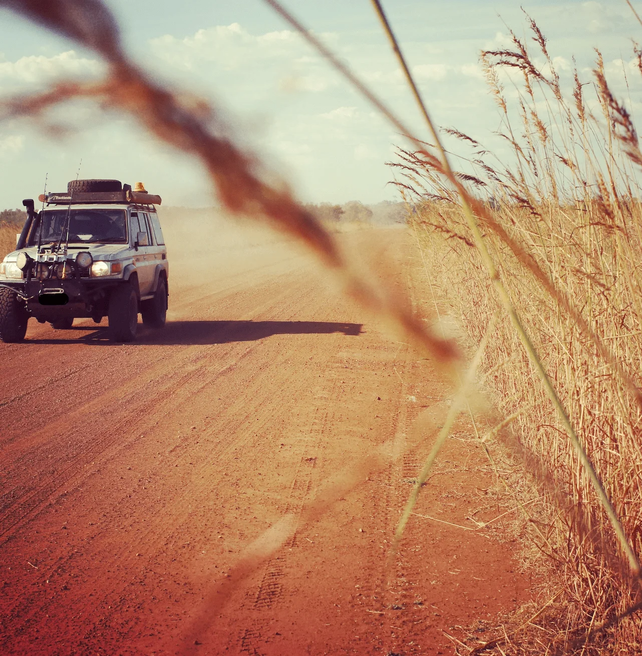 a 4wd car on a dirt road